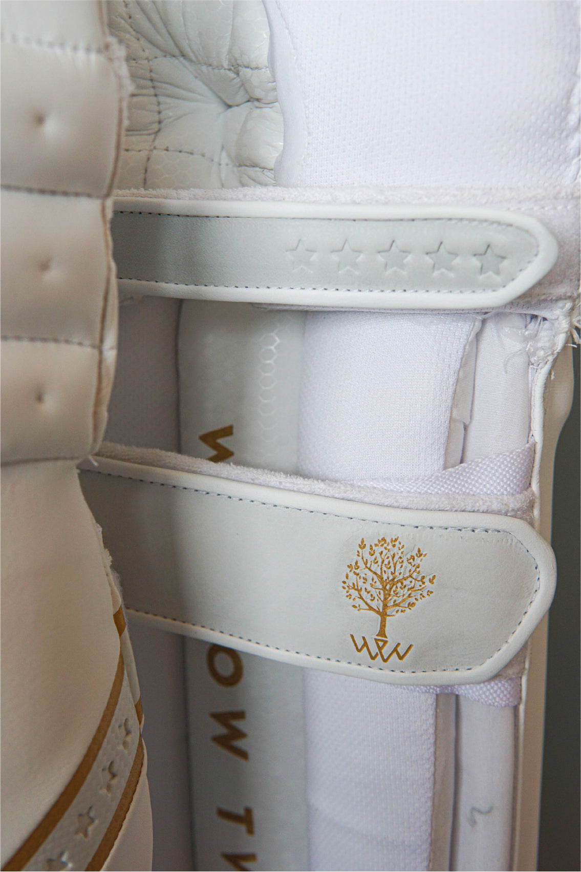 3 strip real leather embossed padded straps provide maximum comfort and stability