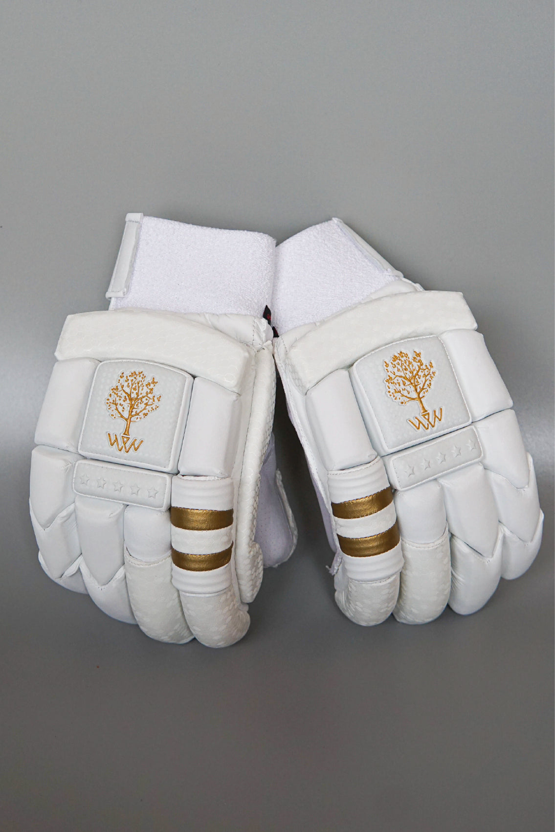 with Willow Twin cricket batting gloves featuring Willow Twin triple stripe